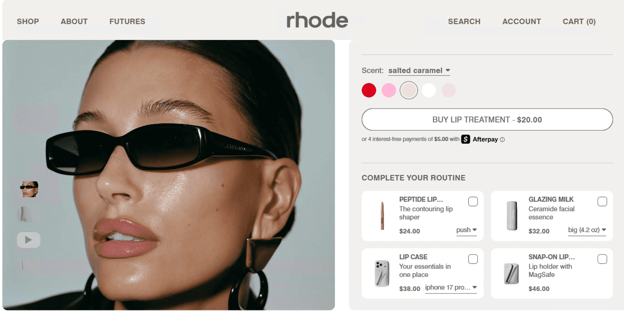 Rhode Peptide Lip Treatment product page featuring Hailey Bieber wearing sunglasses and lip gloss.&nbsp;