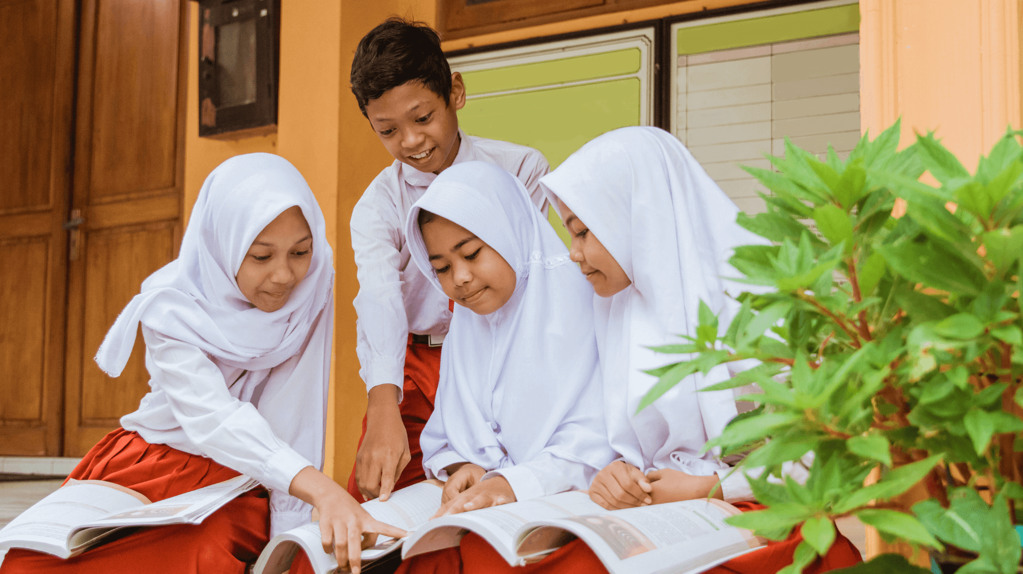 A man stading with Surfboard