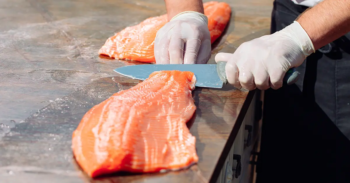 Illustration of a person working in the fishing industry.