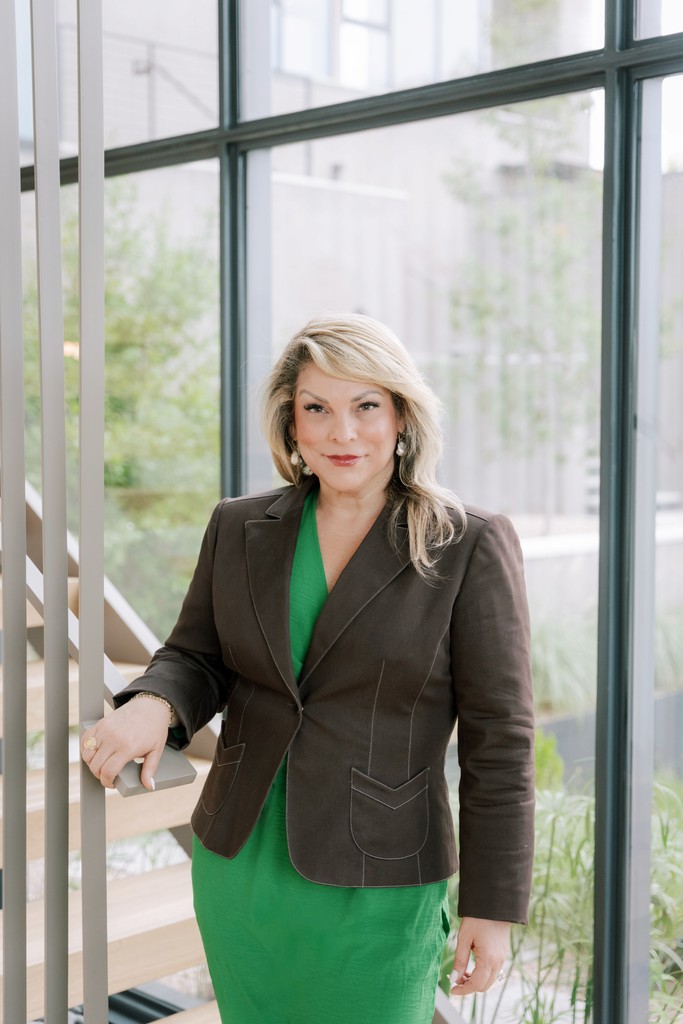 person sitting in a chair in front of a man