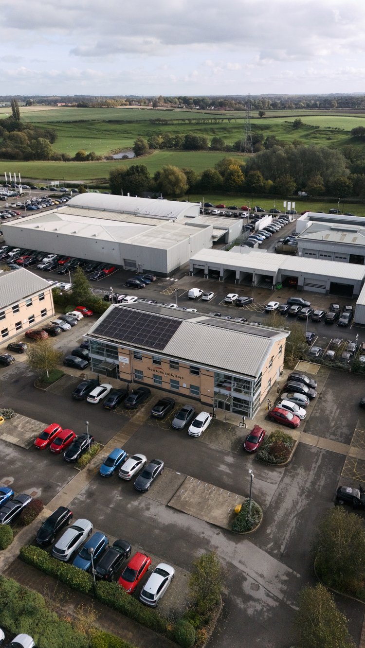 A stunning exterior view of a Newtons Solicitors office, reflecting their established presence in the legal industry.