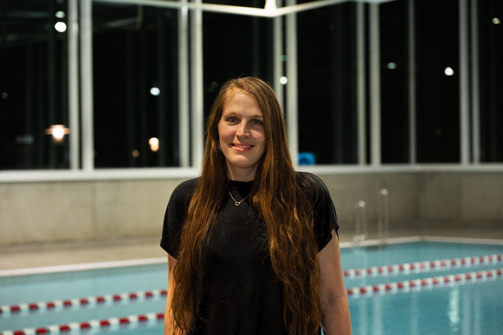 woman in red tube dress in water