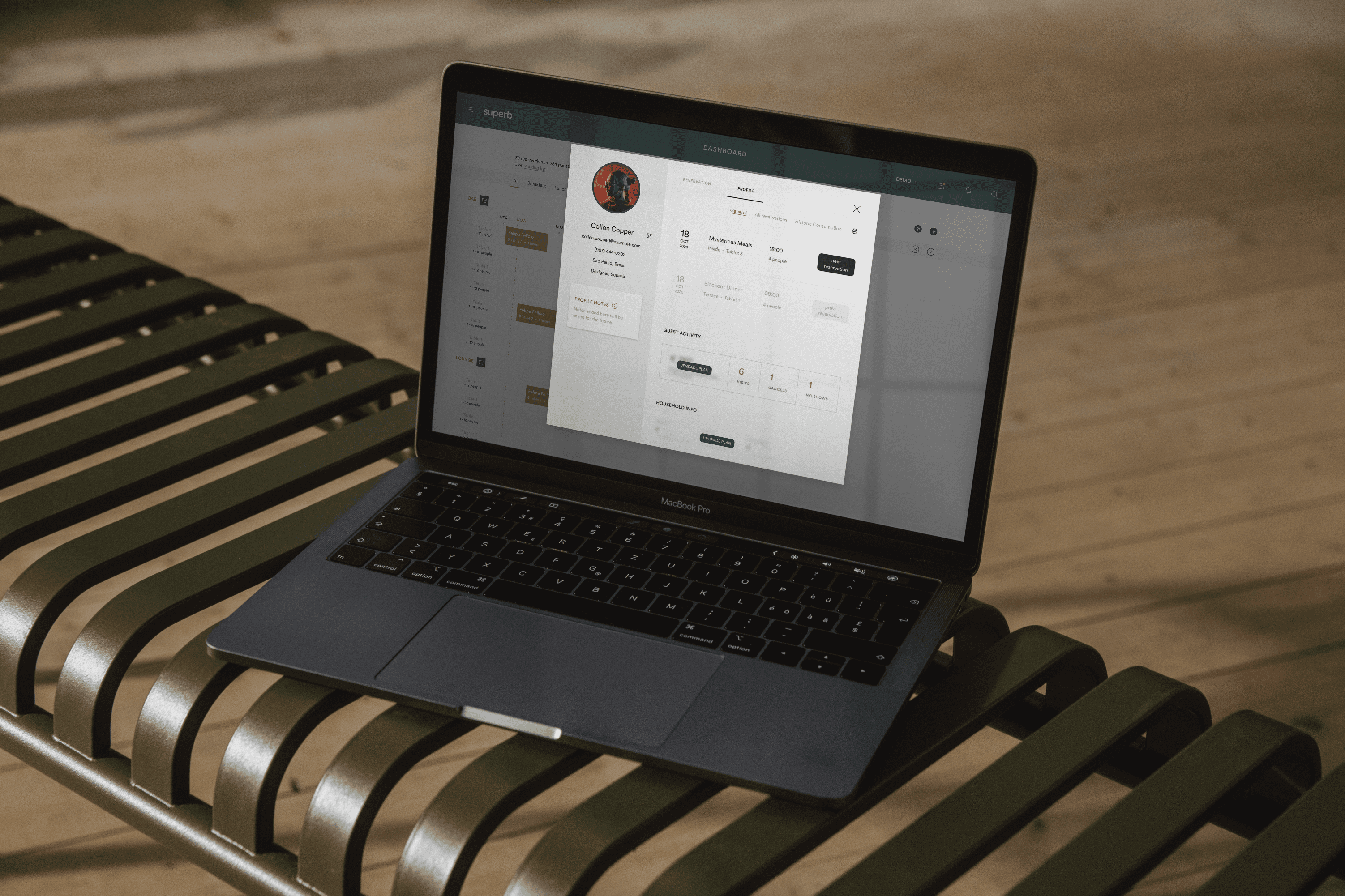 computer with person profile open restaurant management system design
