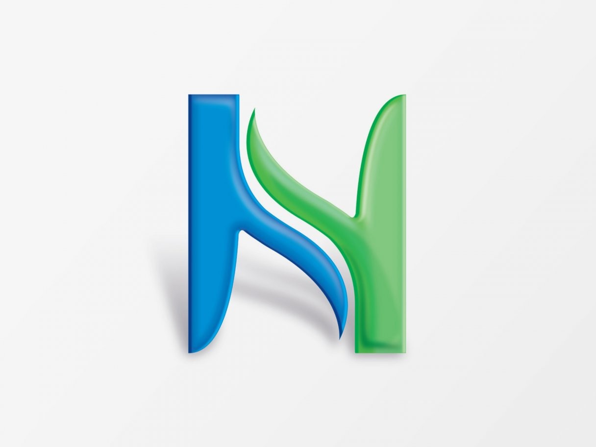 Rustic cabin in a golden field at sunset