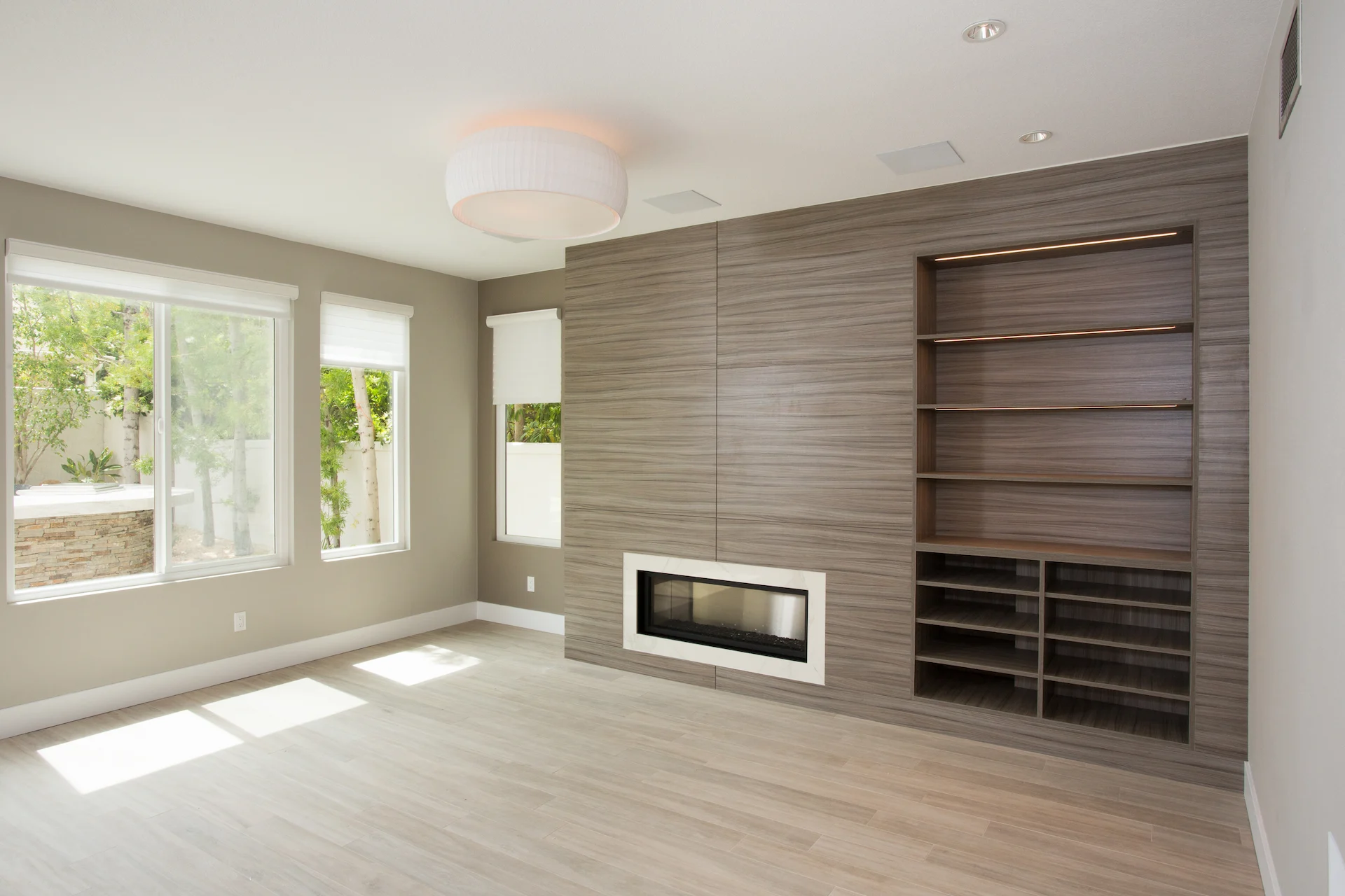 Full view of the 1st guest bedroom, showcasing the open space and elegant design in this modern Newport Beach home.