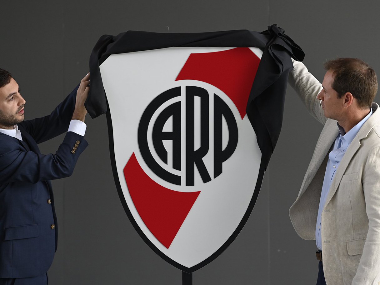 Rustic cabin in a golden field at sunset