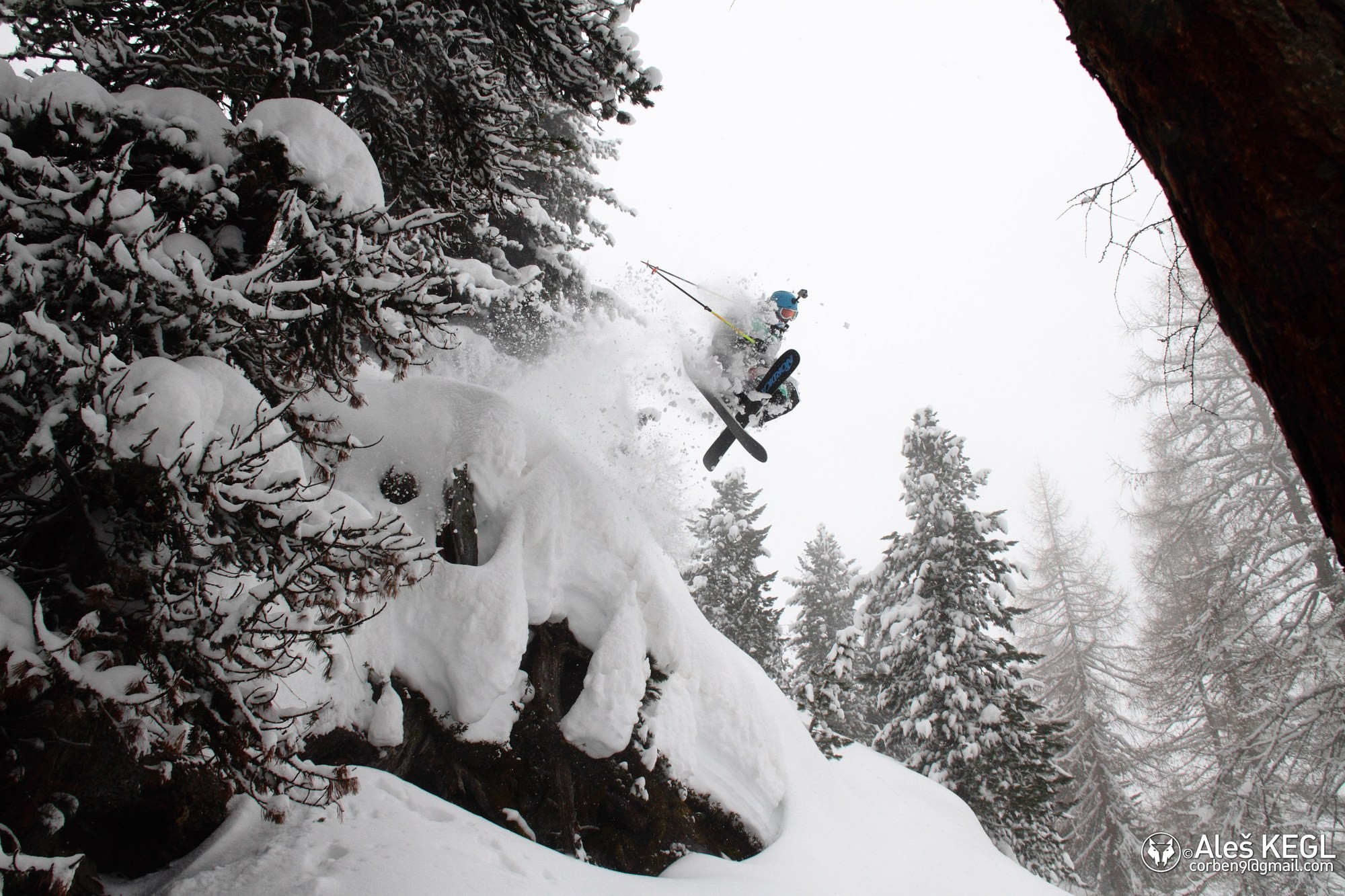 Freeride cliff drop in deep powder — the type of image that forces a winter campaign into the southern hemisphere during the European summer