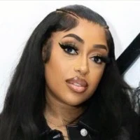 Young man in baseball caps wearing glasses