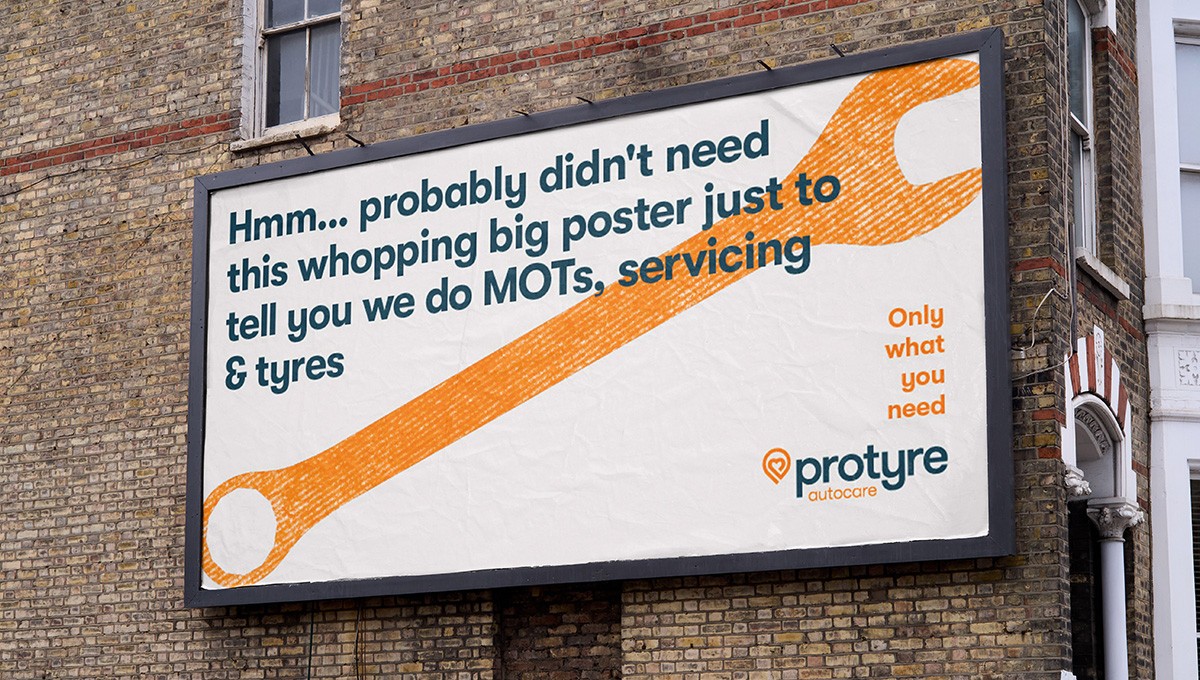 Billboard in a street in London, copy says 'hmm... probably didn't need this whopping big poster just to tell you we do MOTs, servicing and tyres''