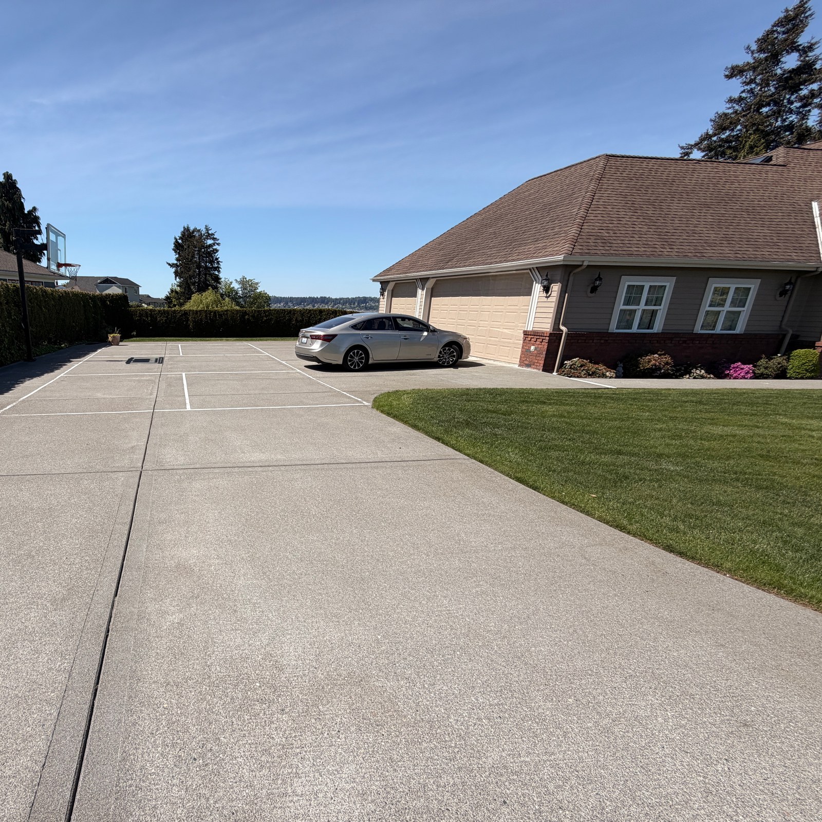 After: long driveway pressure washing by Peterson Property Services in Everett, WA