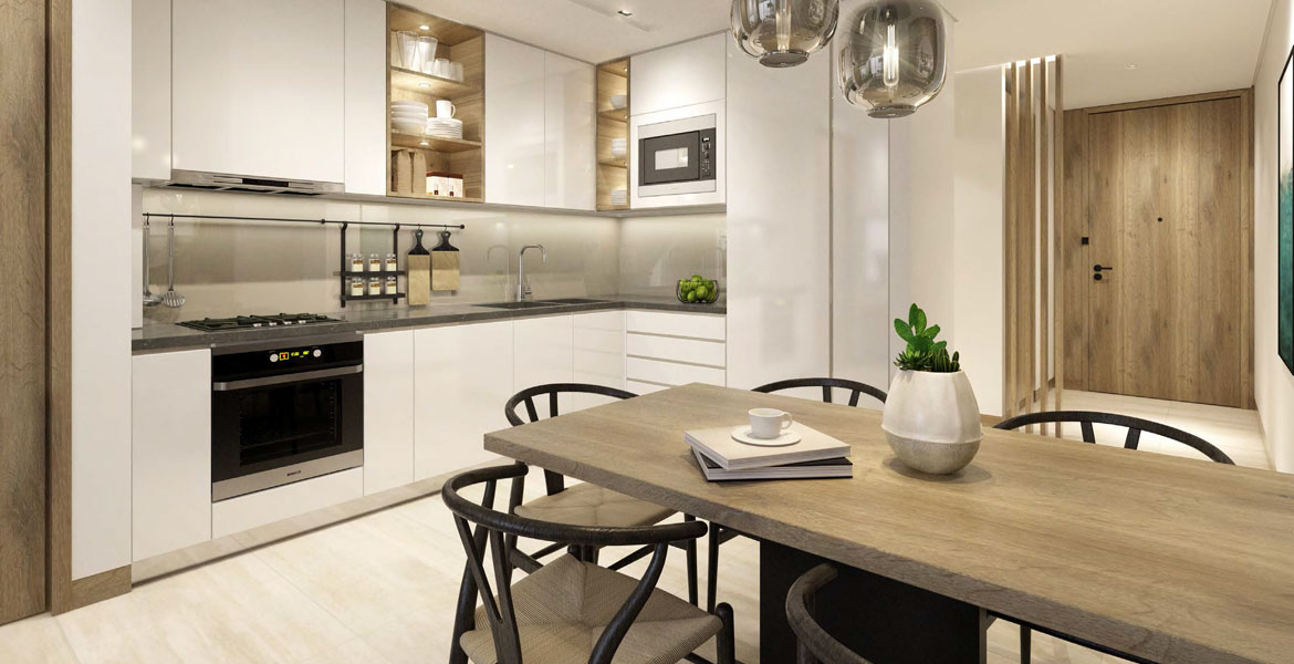  A modern kitchen featuring a dining table and chairs, designed with a sleek aesthetic, located in Vida Dubai.