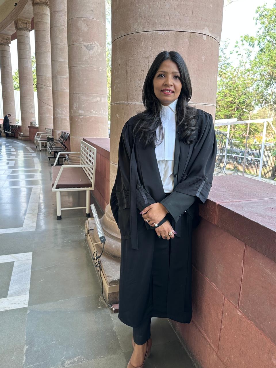 woman in white and blue checked dress shirt