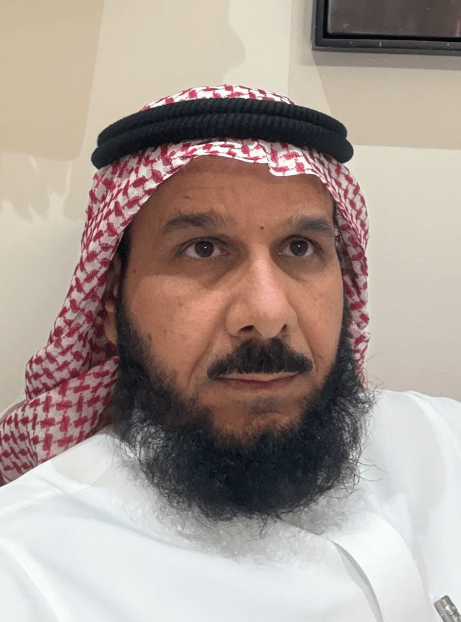 gray metal building frame near tower crane during daytime