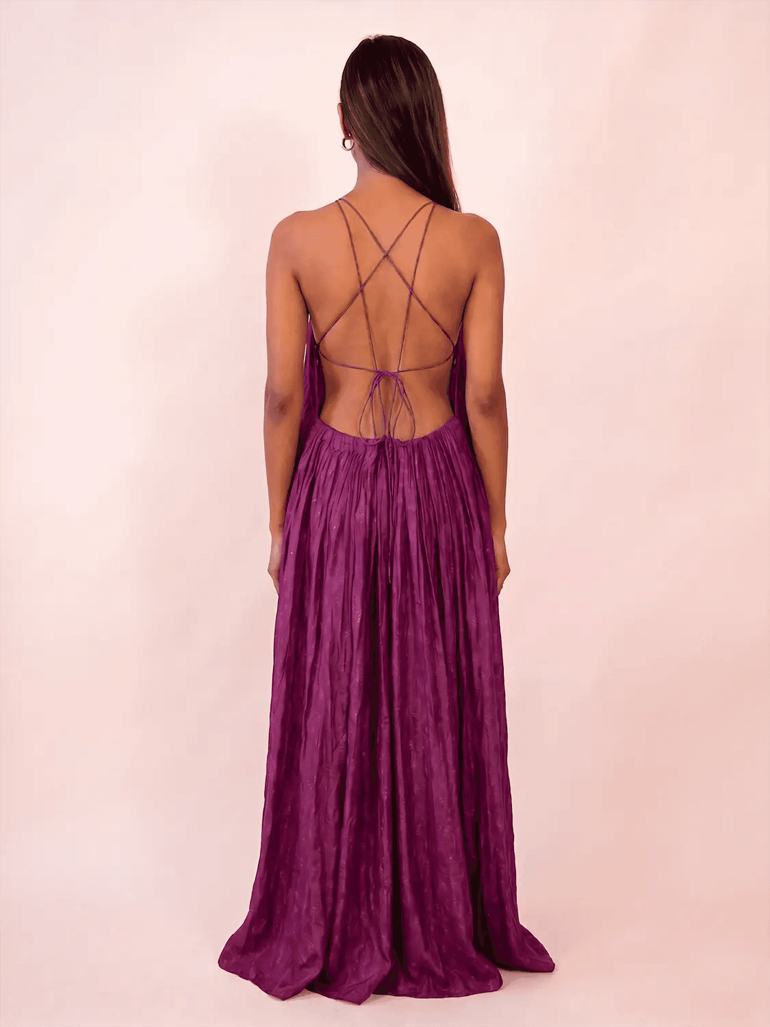 SAHIBA is our one-of-a-kind deep V backless dori dress, handcrafted by skilled artisans in-house using a one-of-a-kind vintage silk saree. 