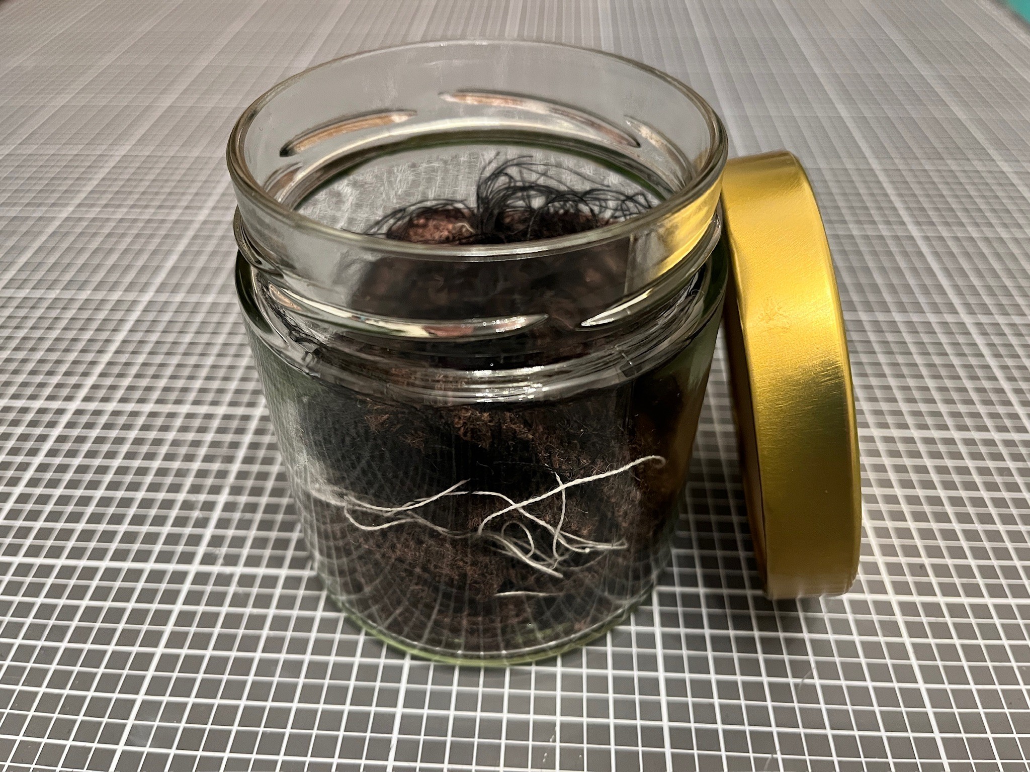 all the waste from production in a small jar