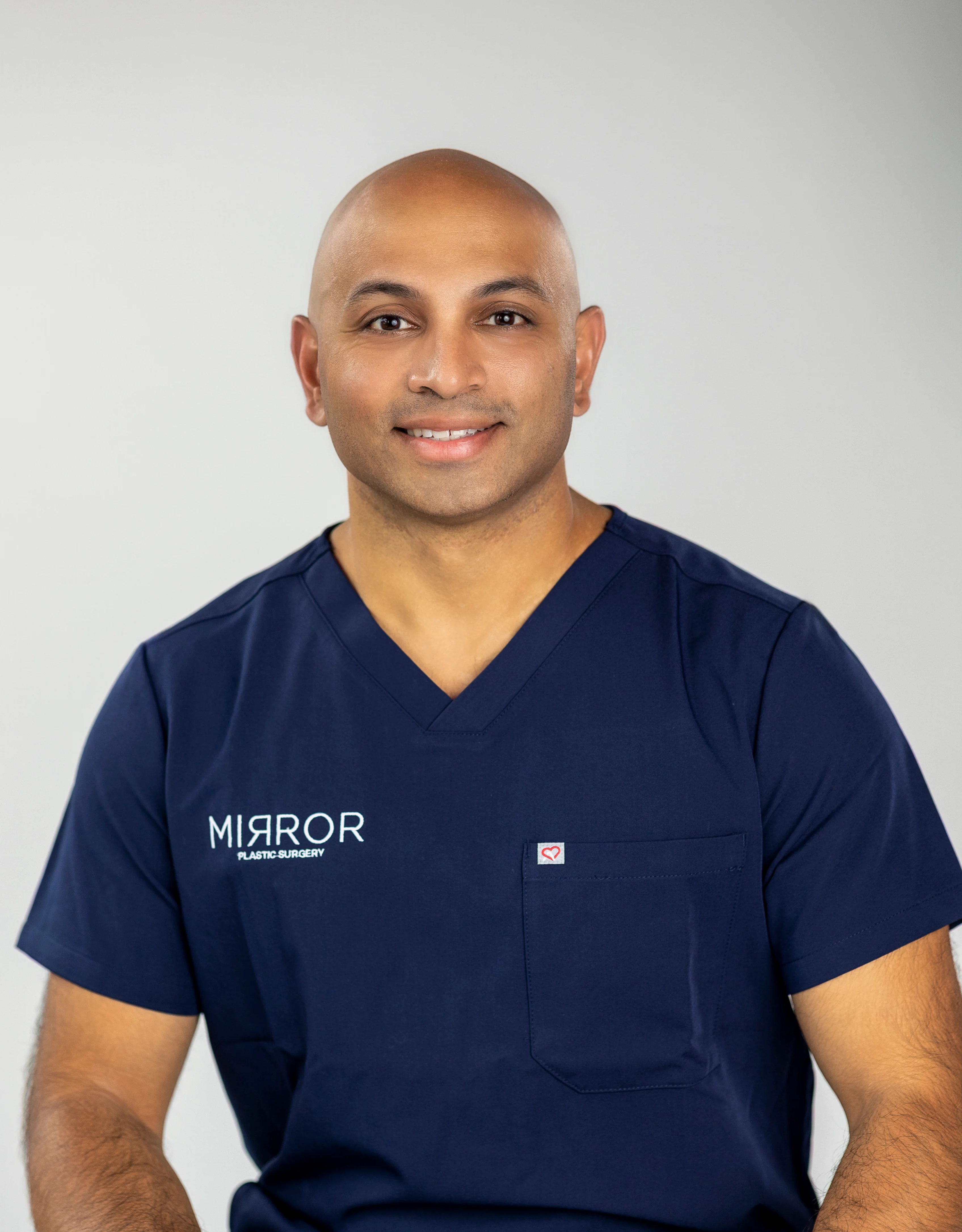 Dr. Akash, Board-Certified Plastic Surgeon