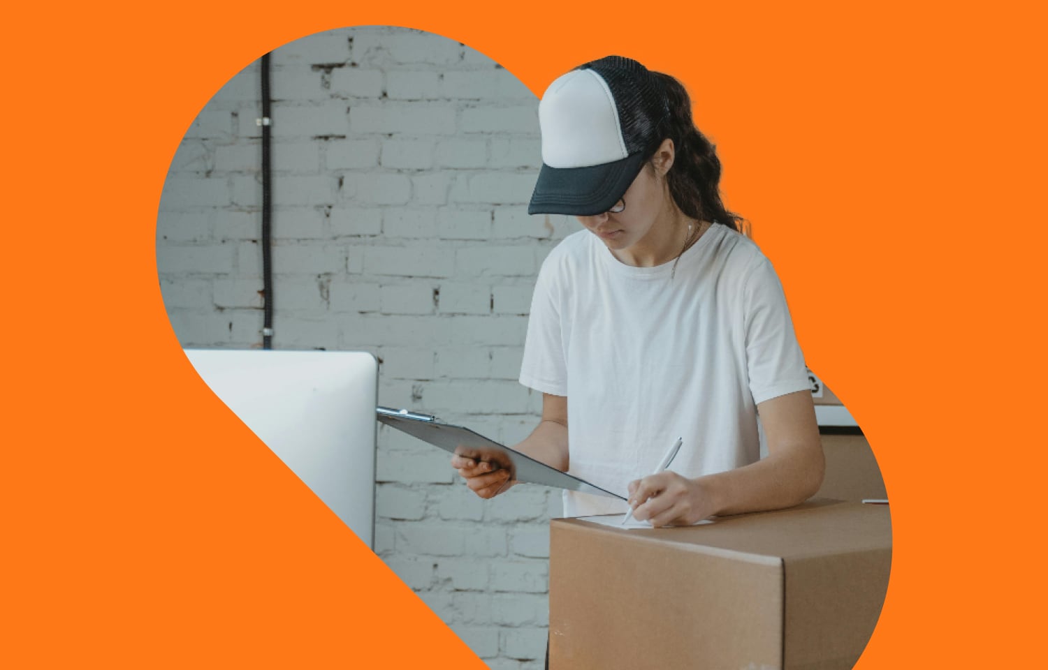 Person holding clipboard and checking stock