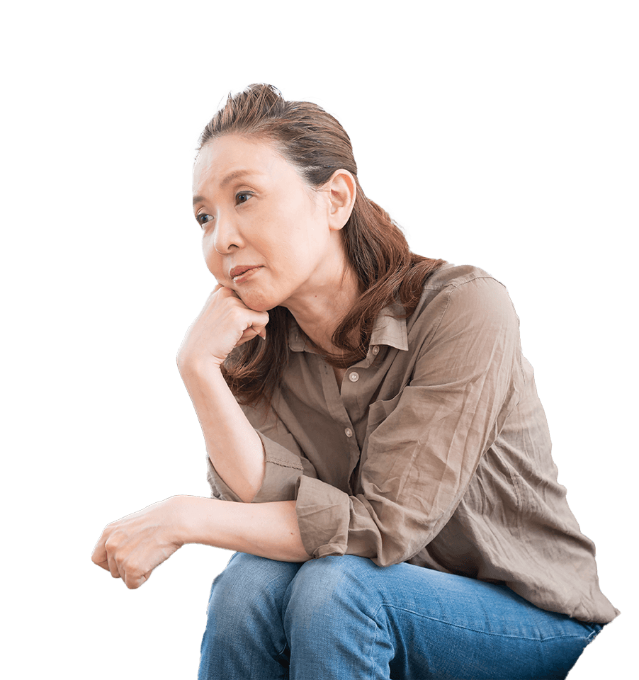 Image of Meilian sitting, head in hand thinking.