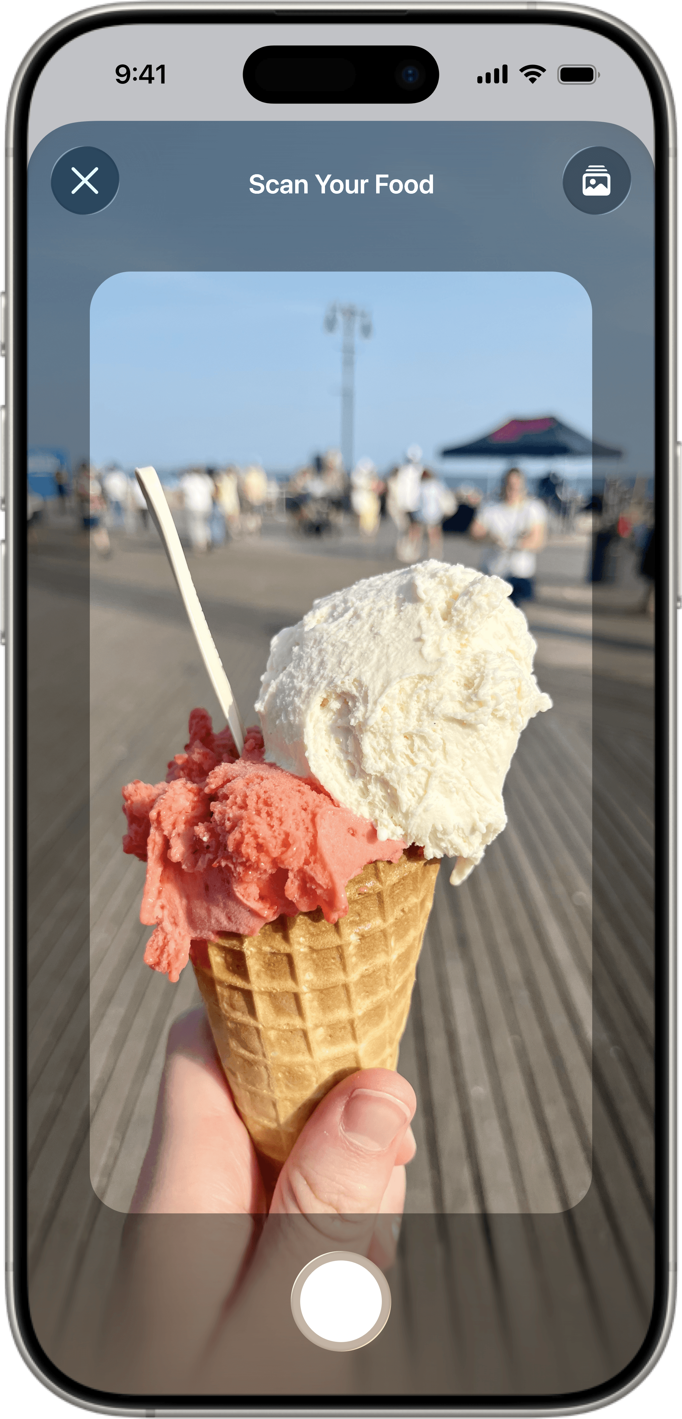 Scanning food with Foodnoms app camera to log meals and track nutrition automatically
