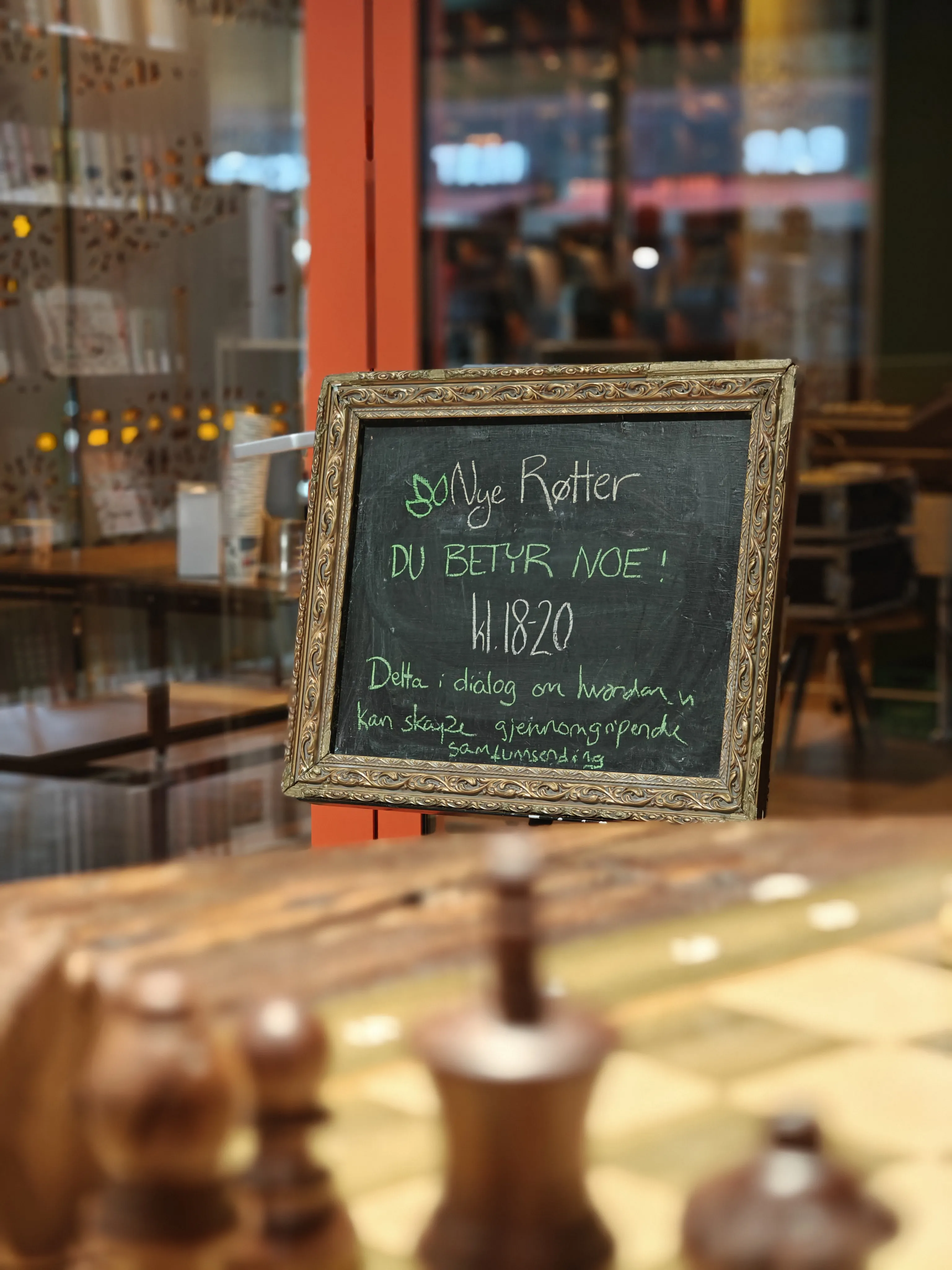Event details written on a blackboard