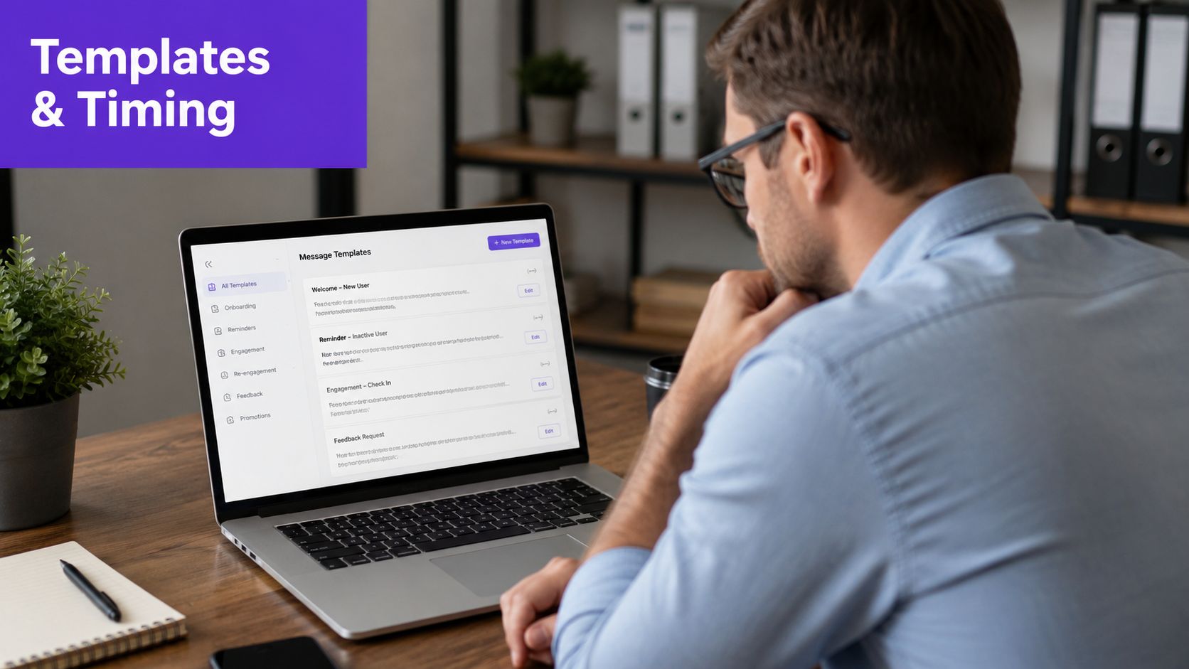 A professional man sitting at a wooden desk using a laptop for lead generation automation tasks.