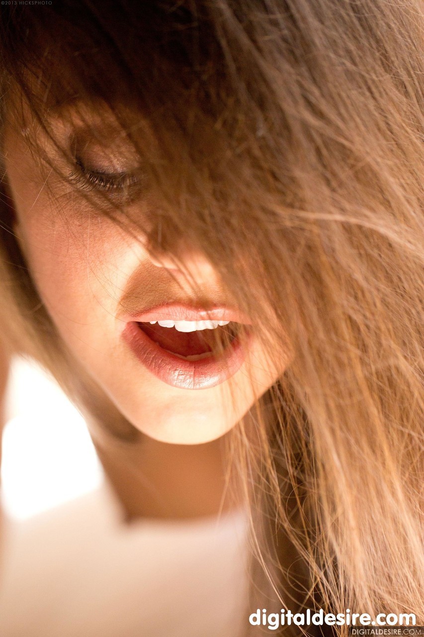kids lying on a glass land and smiling