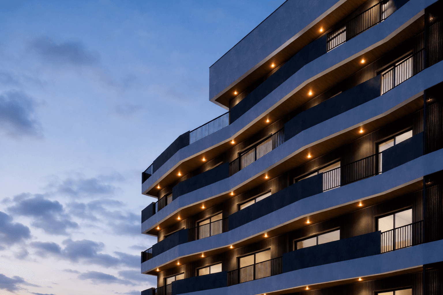 Yellow construction cranes towering over a partially built skyscraper against a clear blue sky, conveying progress and industrial development.