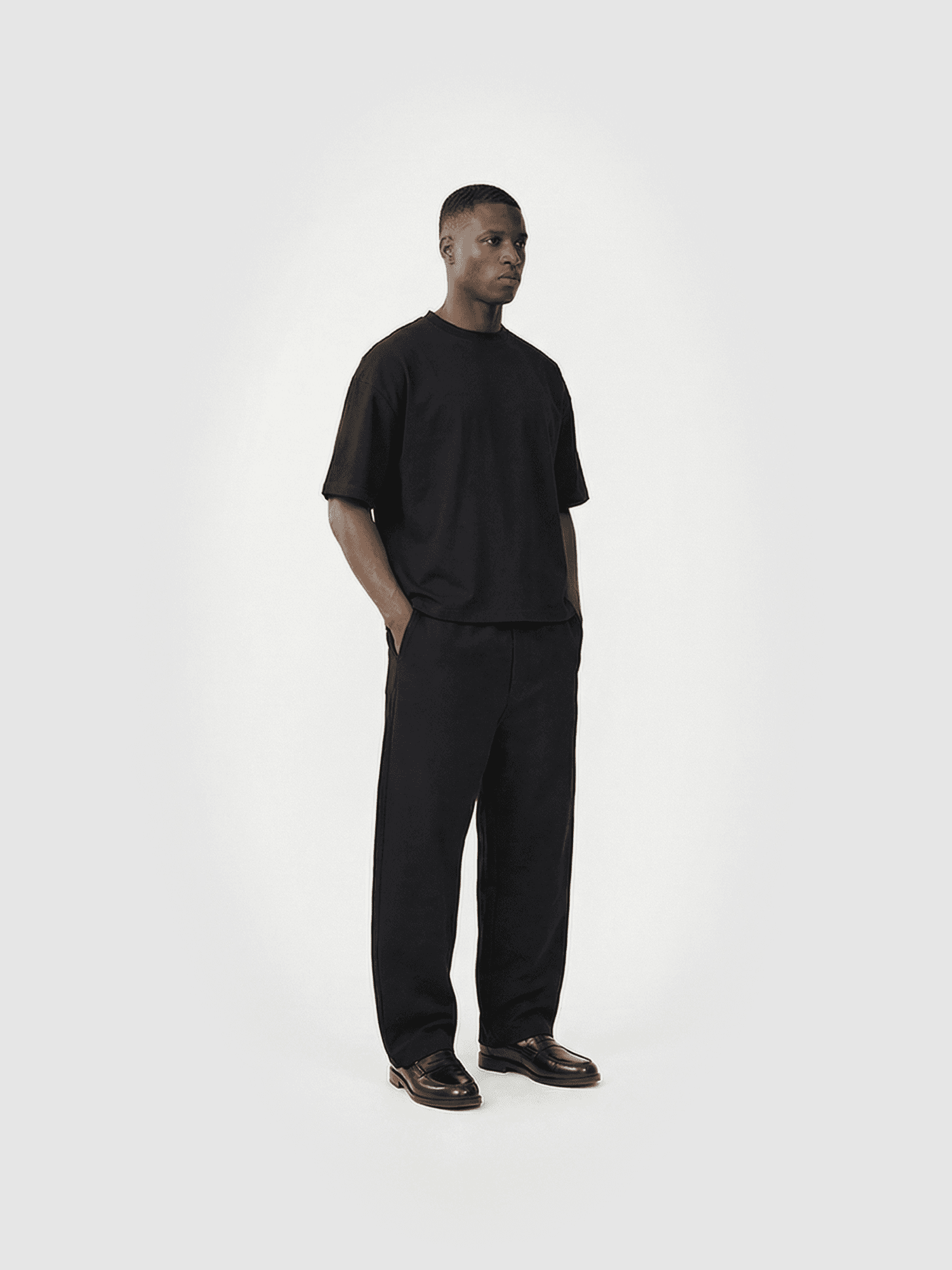 Heavyweight classic crew T-shirt in black — front view on model.