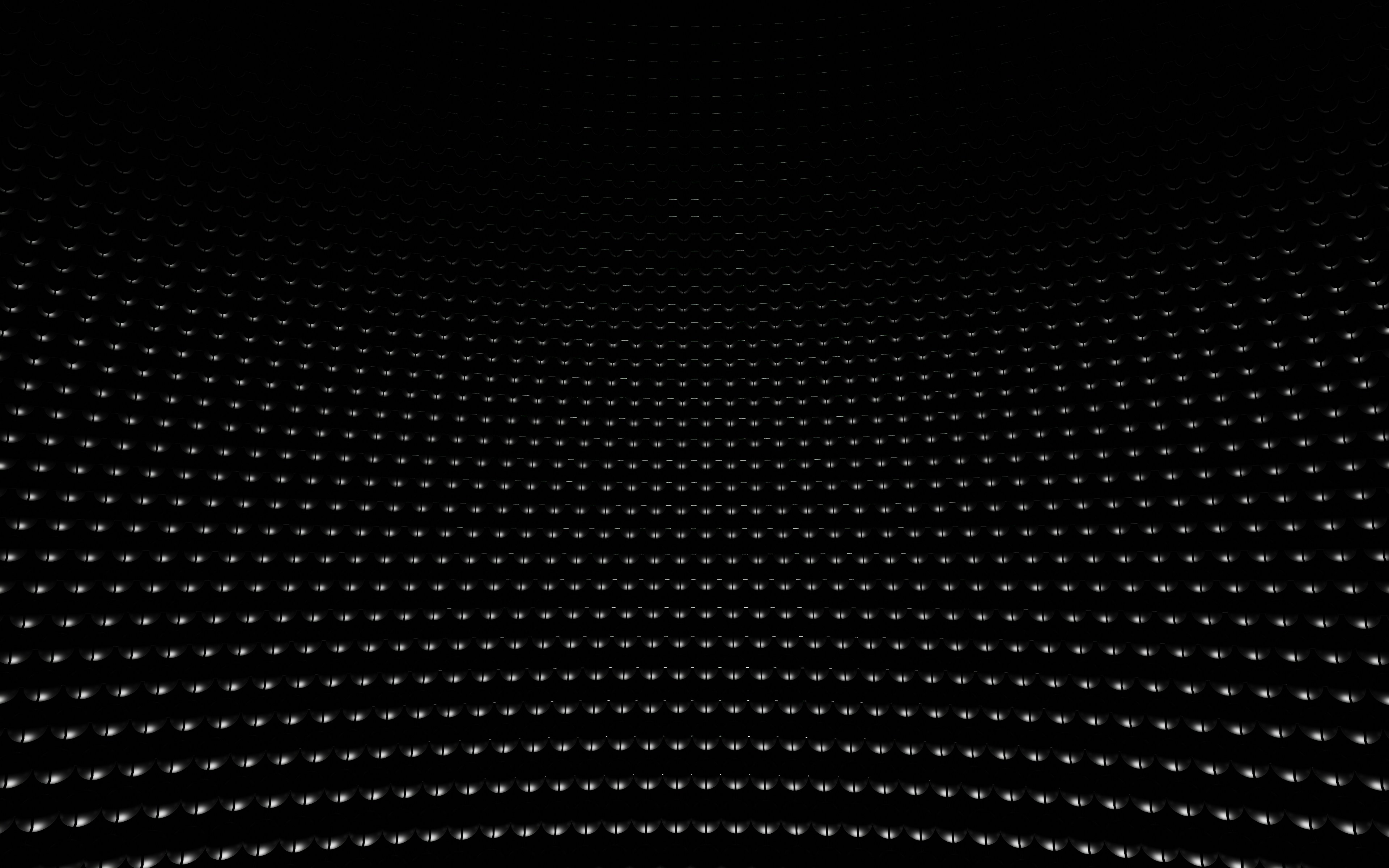 An abstract black and white background with lots of dots