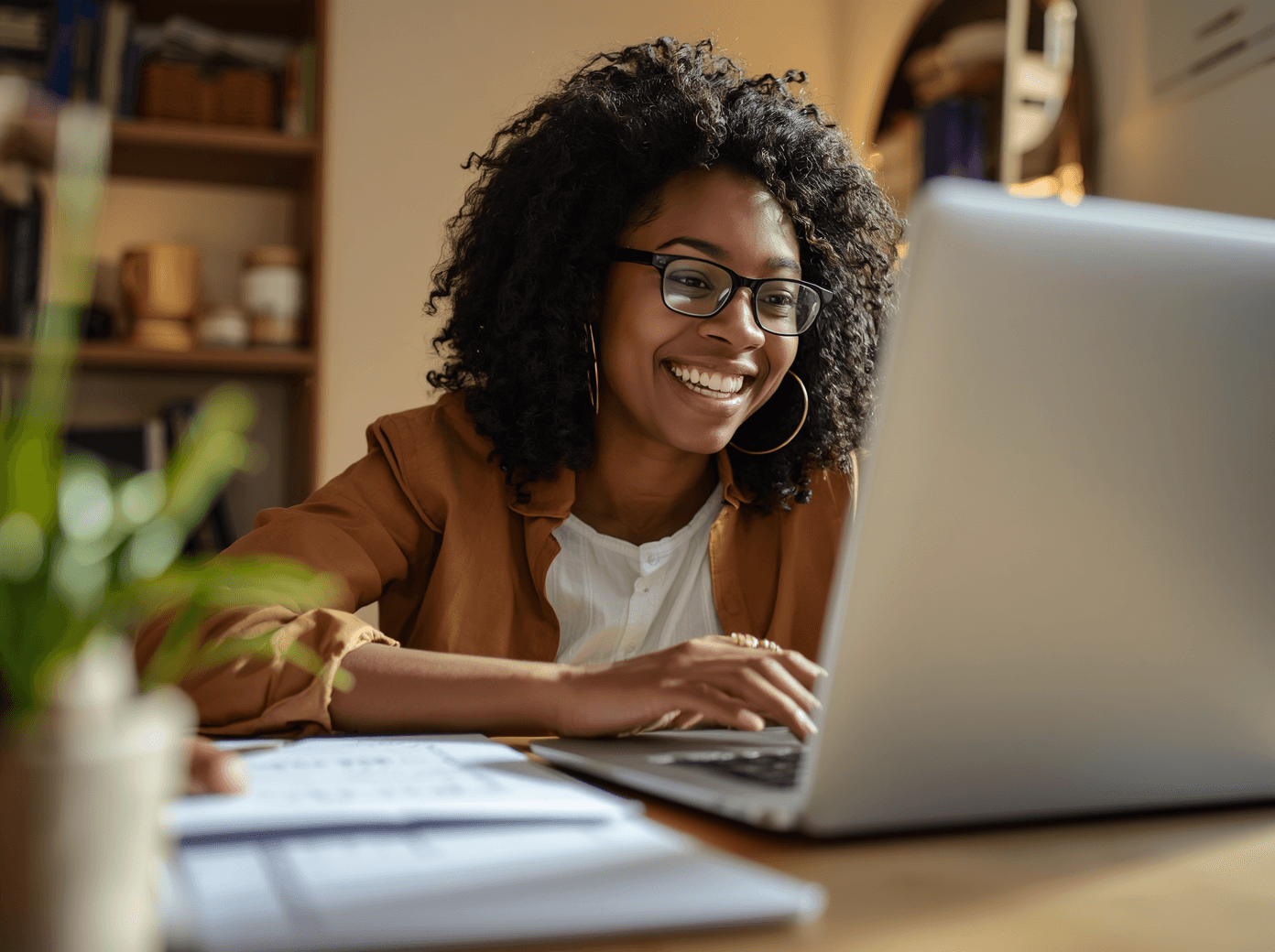 Four people dressed in light clothing walk along a vineyard path towards an old stone farmhouse, with lush grapevines on either side under a soft, golden morning light, capturing the essence of a serene countryside landscape.