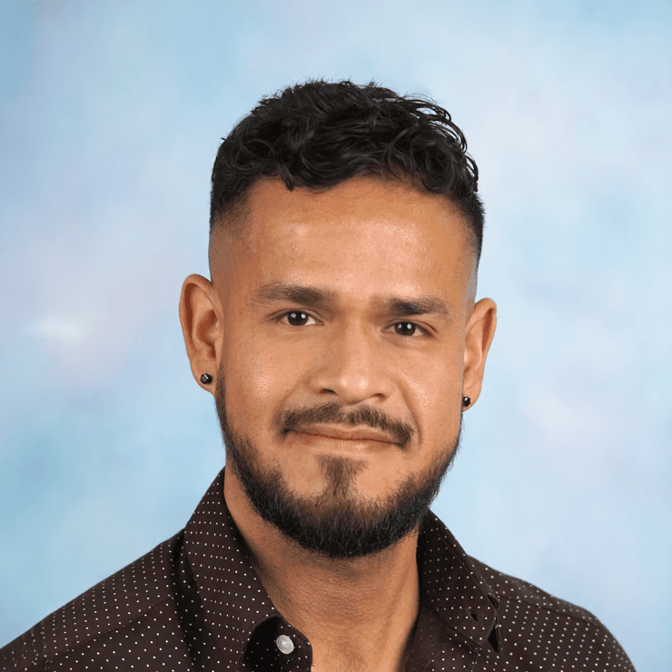 Man smiling in an office