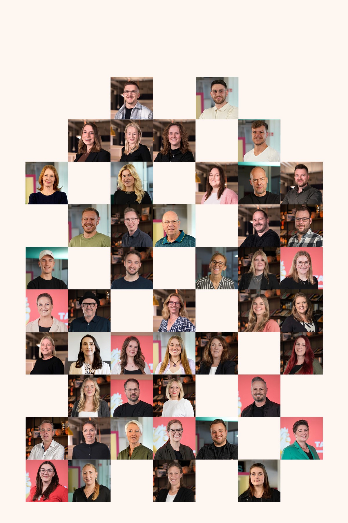 Collaborative work session overhead view of six people collaborating at a rustic wooden table with coffee, papers, and a laptop