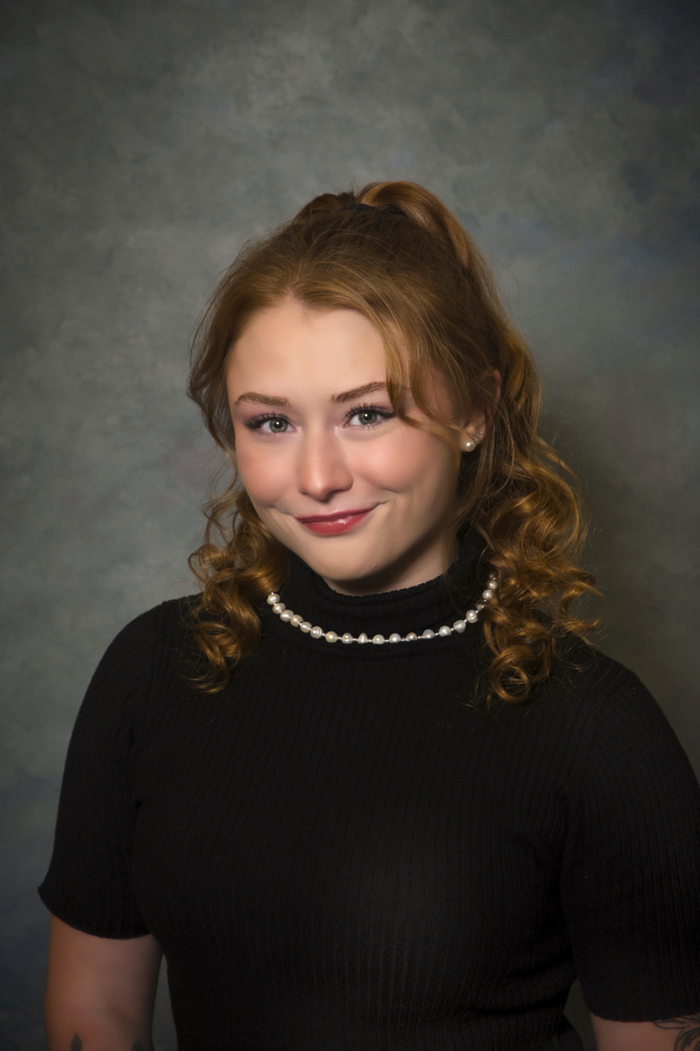 Portrait image of the Editor-in-Chief at FLARE.