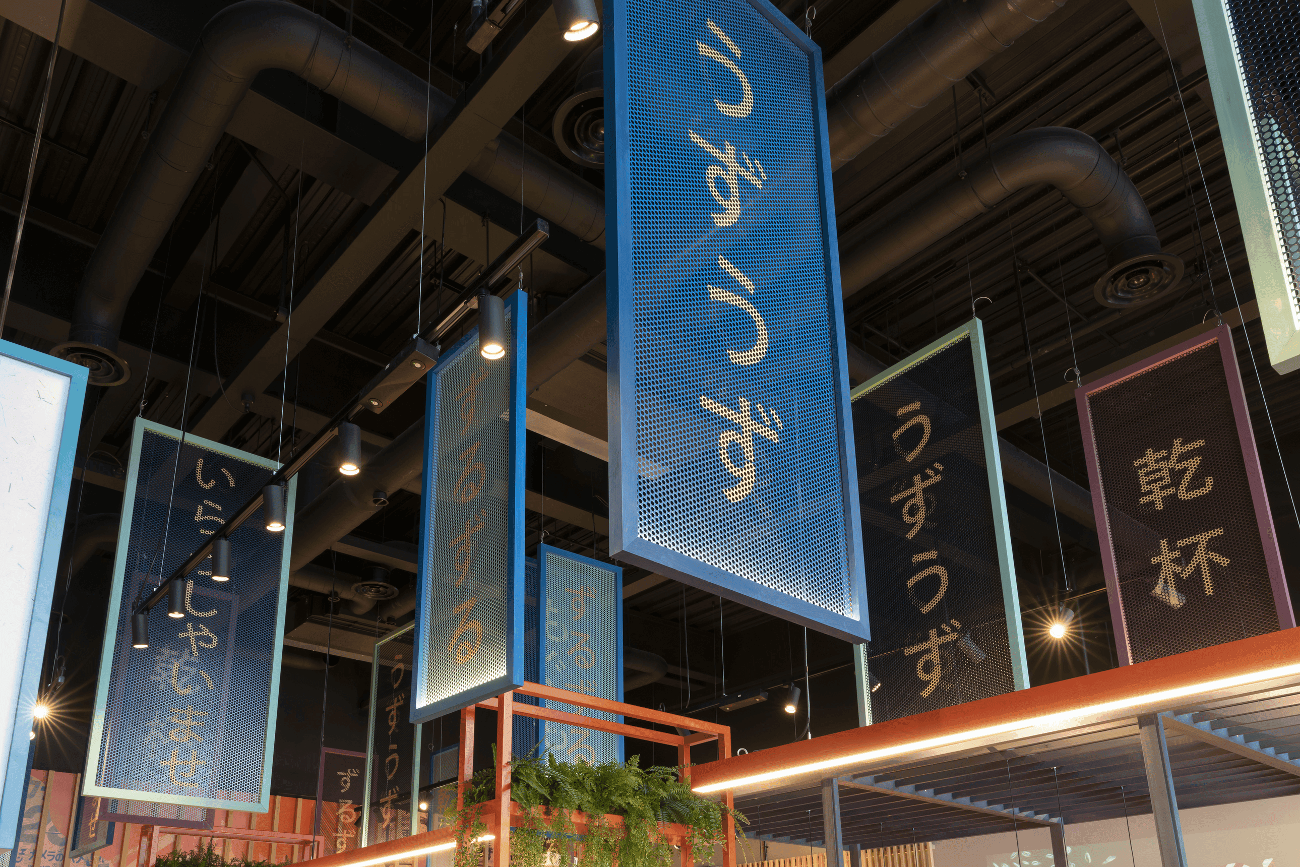 YO! Sushi feature wall graphics and interior finishes within a restaurant shopfitting project