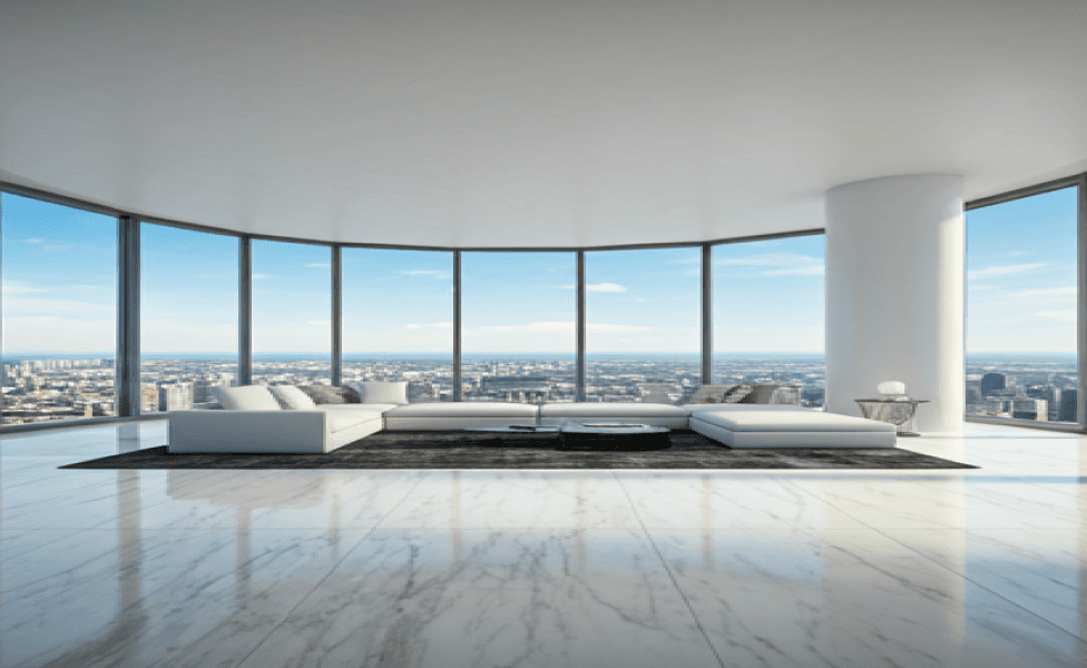 Modern living room featuring large windows with a view of the city skyline.