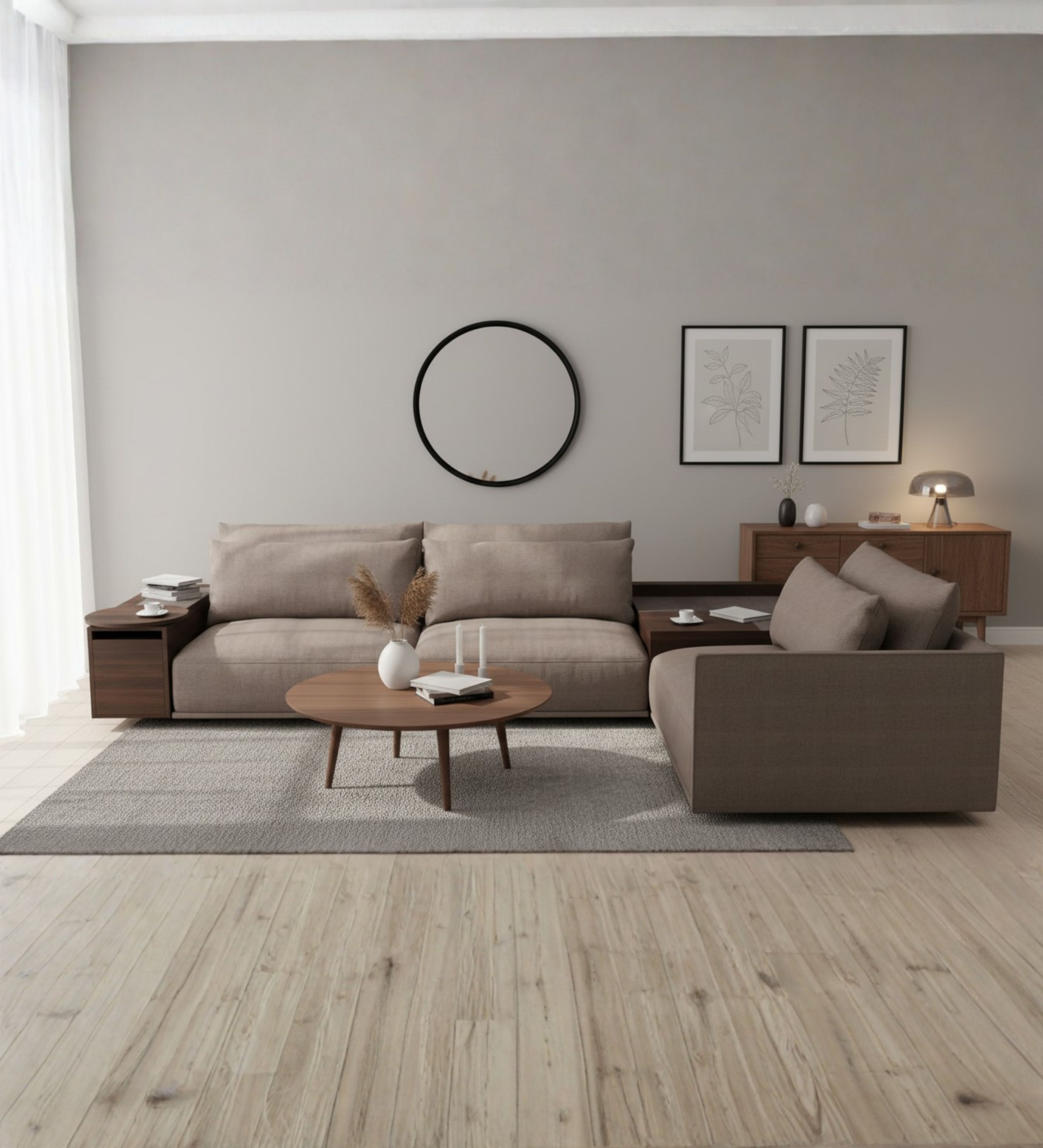 A living room featuring a spacious sofa with coordinated cushions