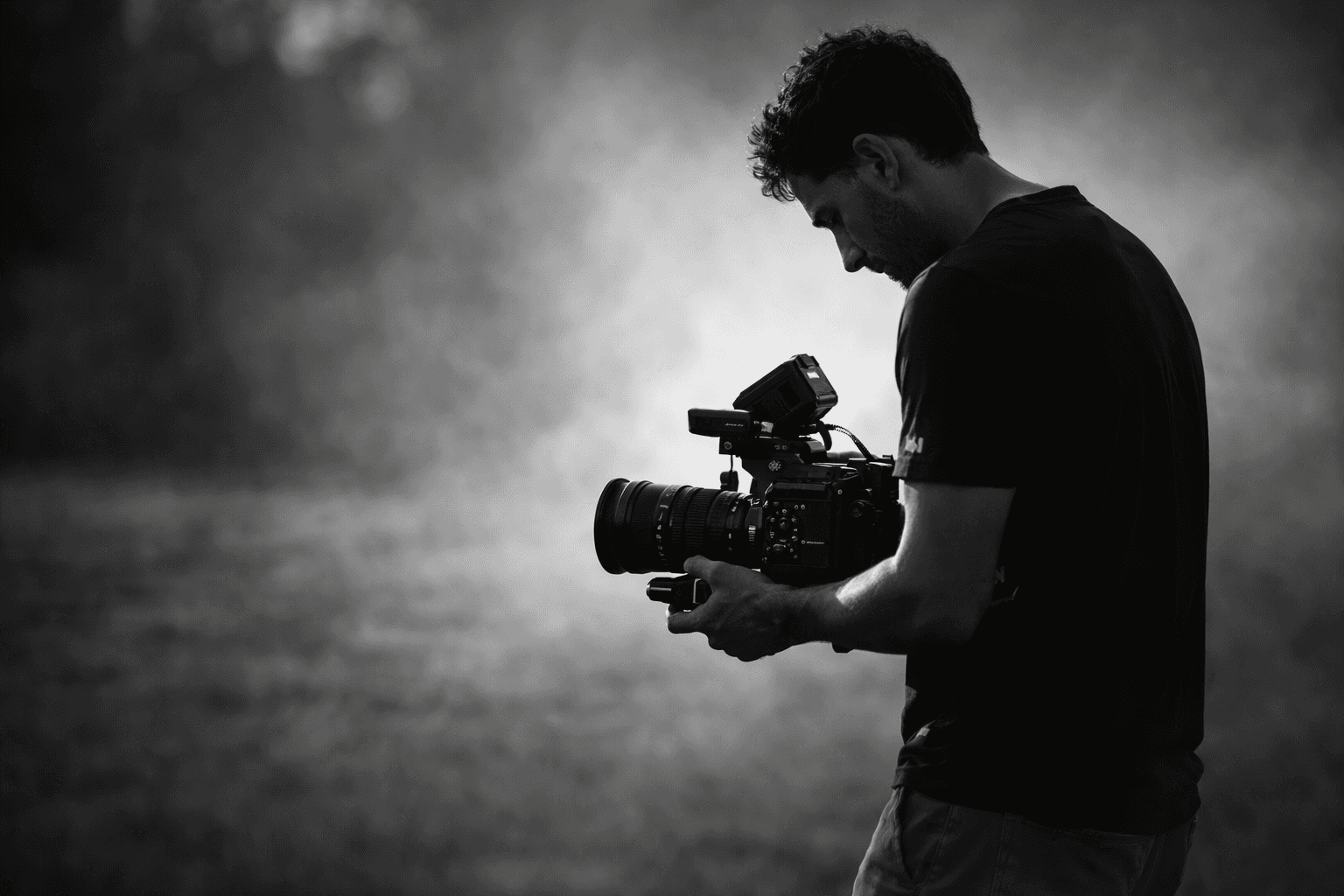 black and gray camera tripod