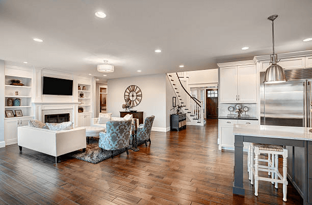 Renovated kitchen with new cabinets, countertops, and lighting