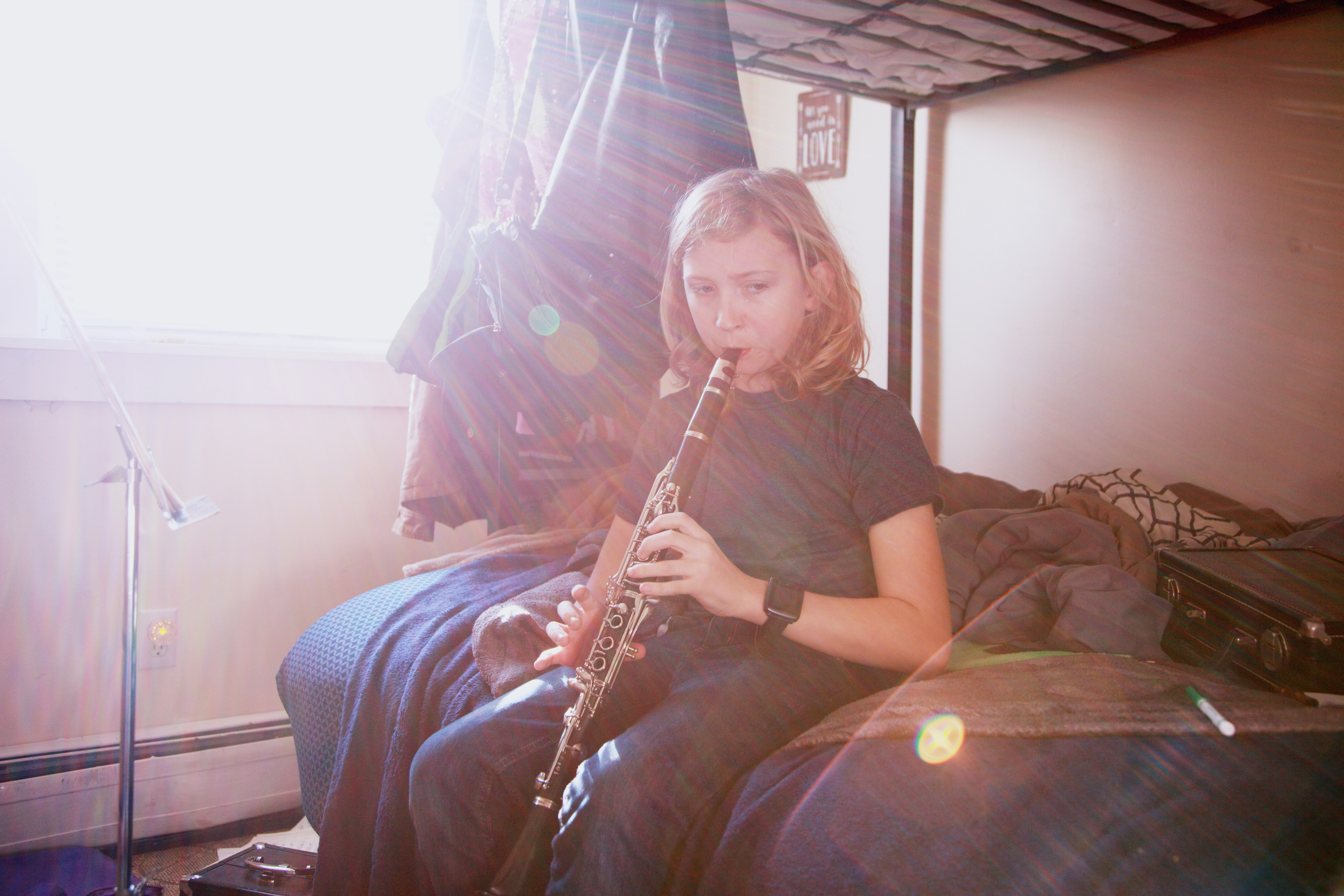 girl playing musical instrument