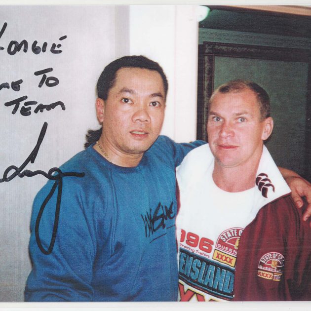 Longy Nguyen with Allan Langer in a Queensland State of Origin archive photograph, 1996