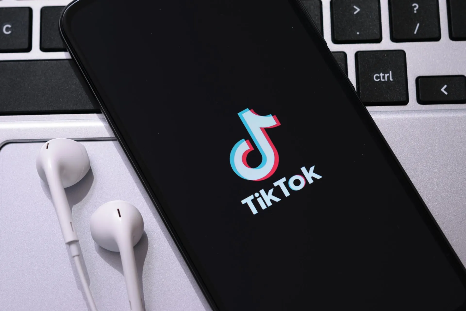 A phone with the TikTok app, where Zorilla's Promote strategy turns 'virality' into real TikTok Shop sales.