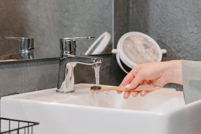 A toothbrush in a sink