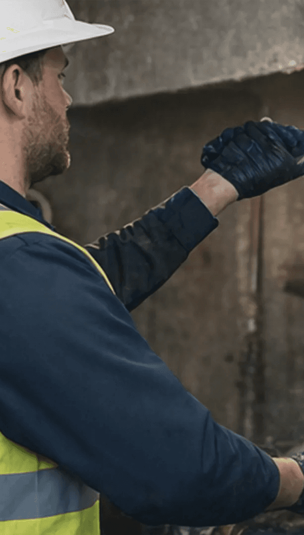 workman with flashlight