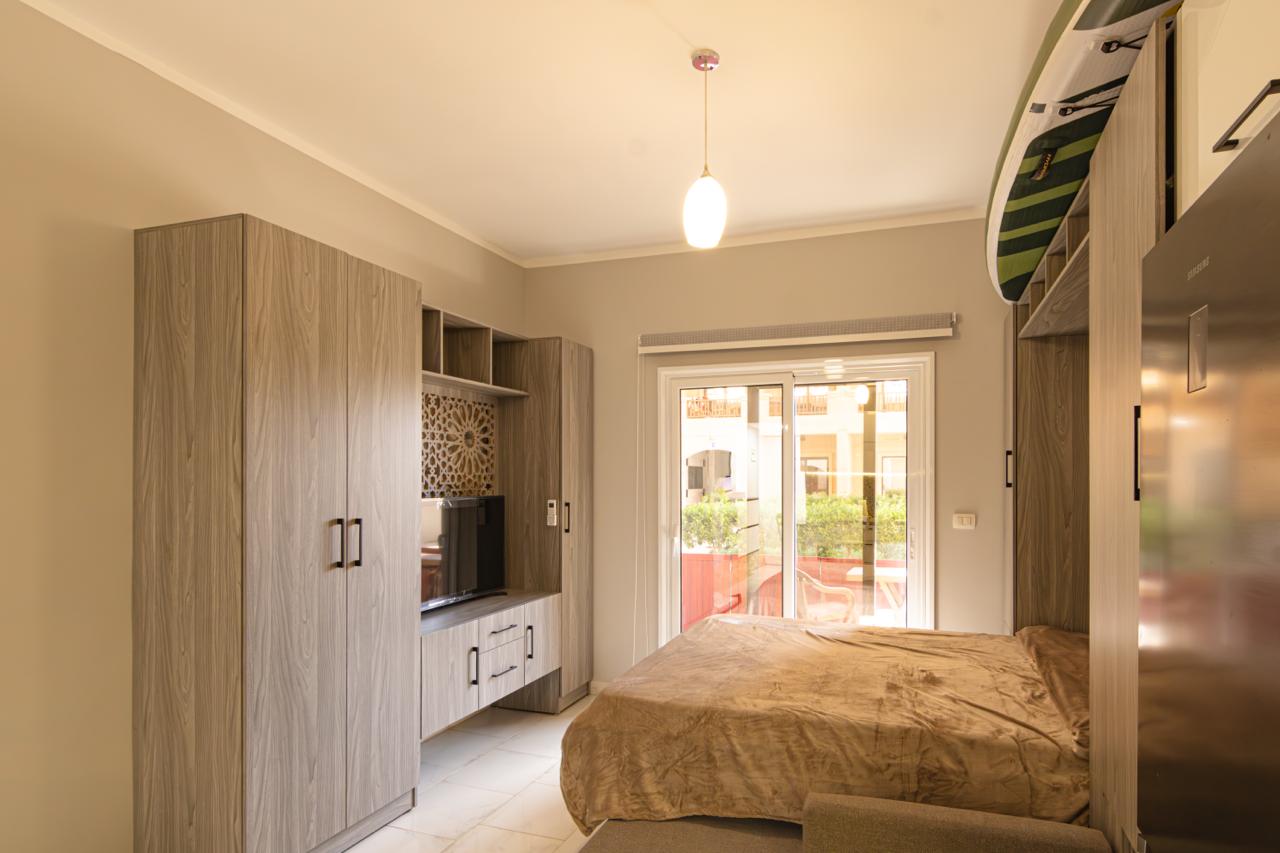 houses surrounded with plants