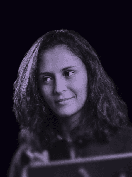 Professional portrait of person on a modern purple gradient background, business headshot for digital branding and team profile.