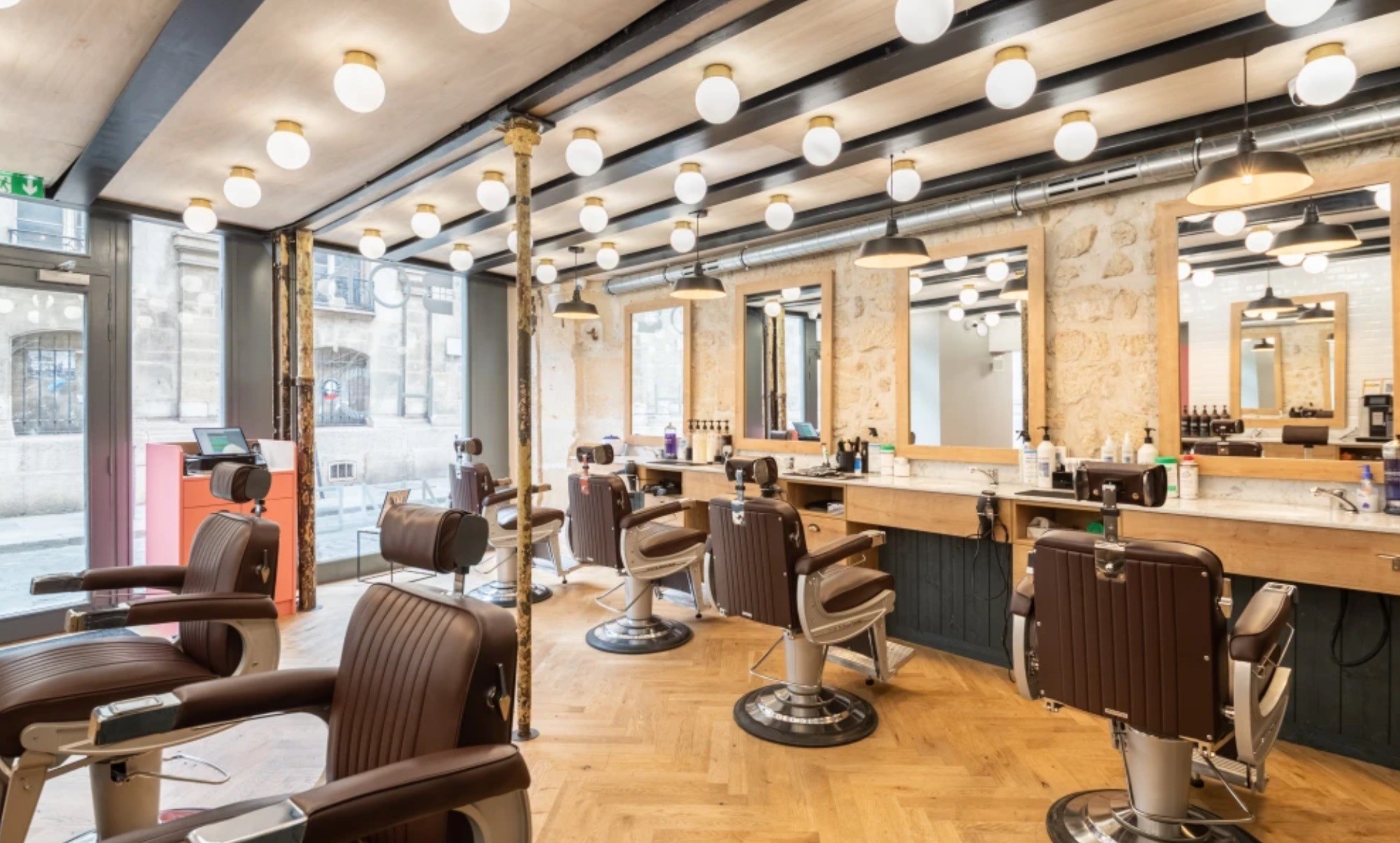 A fast black sports car races down the highway.