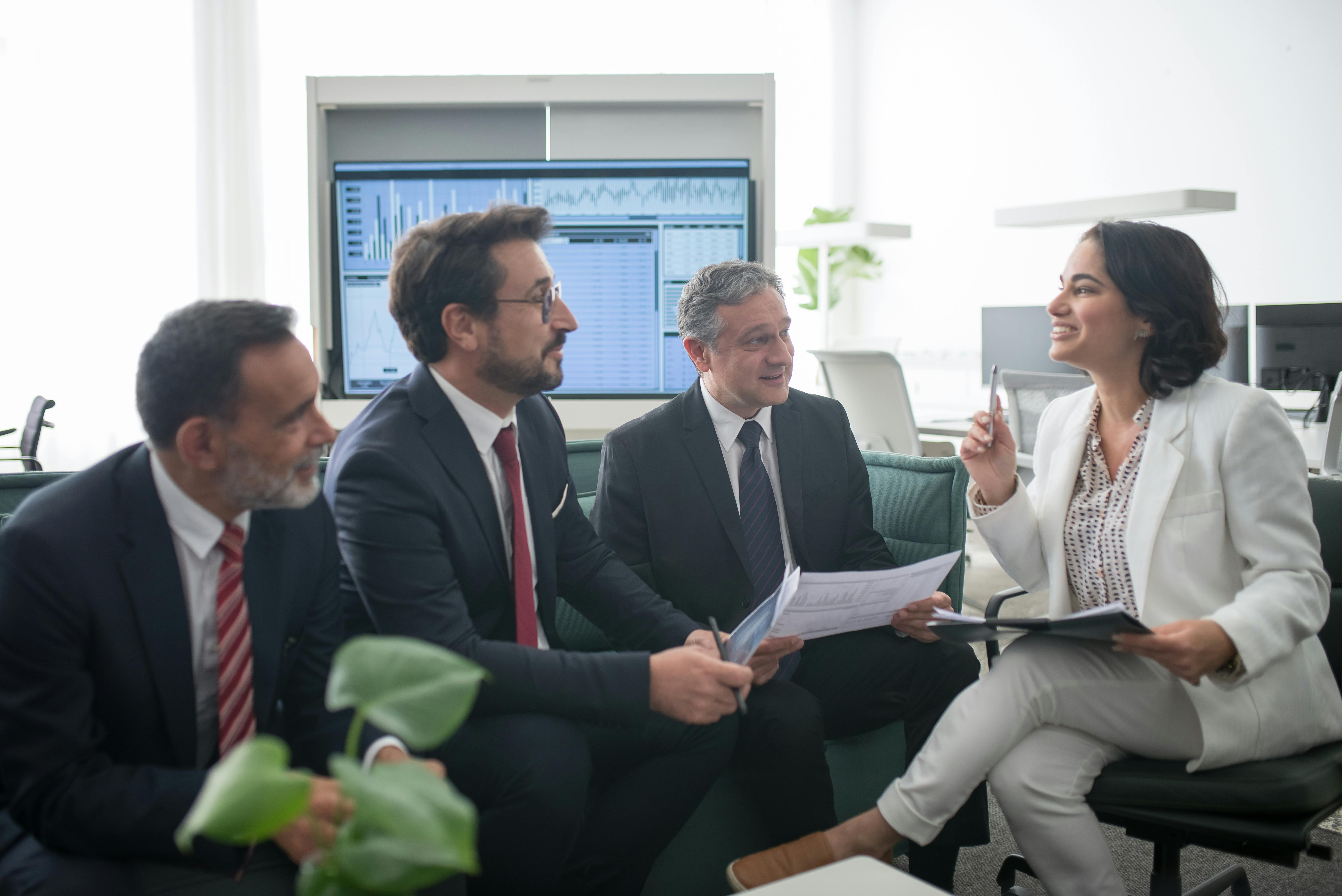 Men talking to a CEO after cold email success