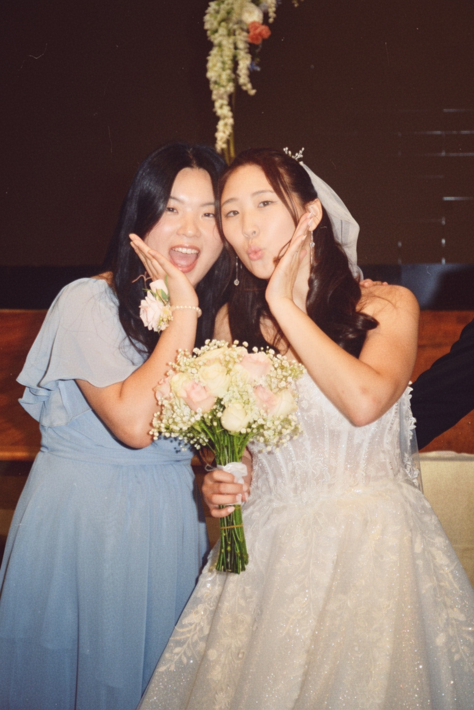 Bride and bridesmaid making playful faces — Korean wedding reception Atlanta GA