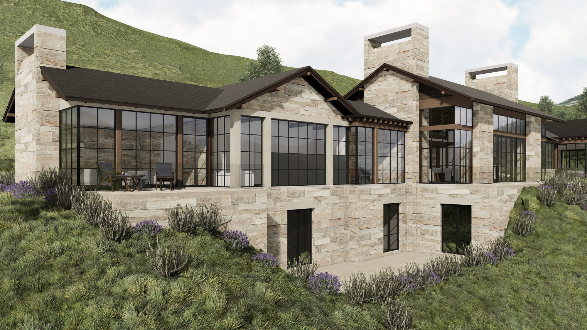 Modern stone house exterior built into a lush green hillside.