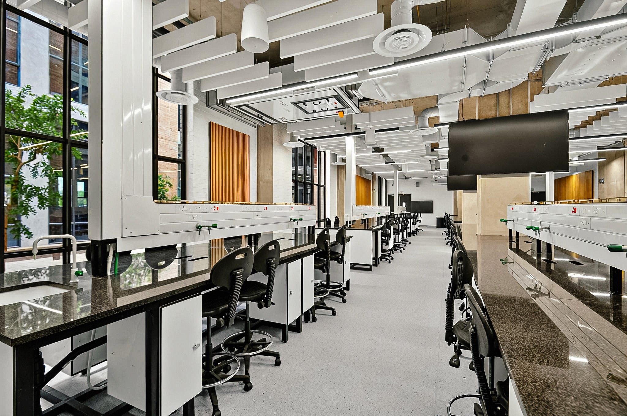 Close-up of modern device with metallic finish and red LED light accents.